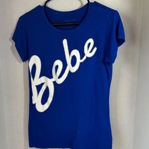 Bebe blue short sleeve shirt size medium